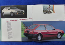 Lade das Bild in den Galerie-Viewer, Chevrolet 1986 Spectrum Sedan Hatchback US-Prospekt Brochure 08.1985 Großformat