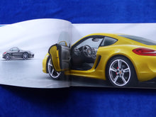 Lade das Bild in den Galerie-Viewer, Porsche Cayman S Typ 981c MJ 2013 - Hardcover Prospekt Brochure 10.2012

