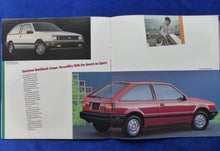 Lade das Bild in den Galerie-Viewer, Chevrolet 1986 Spectrum Sedan Hatchback US-Prospekt Brochure 08.1985 Großformat
