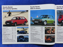 Lade das Bild in den Galerie-Viewer, Toyota Programm - Starlet Corolla Celica LandCruiser - Prospekt Brochure 04.1983
