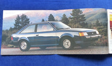 Lade das Bild in den Galerie-Viewer, Ford 1985 Escort - US-Prospekt Brochure 01.1985 USA
