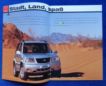 Lade das Bild in den Galerie-Viewer, Suzuki Grand Vitara 3-Türer MJ 2004 - Prospekt Brochure 06.2003
