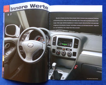 Lade das Bild in den Galerie-Viewer, Suzuki Grand Vitara 3-Türer MJ 2004 - Prospekt Brochure 06.2003
