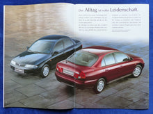 Lade das Bild in den Galerie-Viewer, Mitsubishi Carisma MJ 1997 - Prospekt Brochure 09.1996
