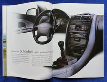 Lade das Bild in den Galerie-Viewer, Mitsubishi Carisma MJ 1997 - Prospekt Brochure 09.1996
