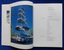 Lade das Bild in den Galerie-Viewer, Porsche Geschäftsbericht 2002/2003 Umsätze Zahlen Modelle 911 GT3 Cayman Cayenne
