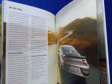 Lade das Bild in den Galerie-Viewer, Porsche Modelle 2010 - 911 GT3 Carrera Cayman Cayenne Boxster - Prospekt 12.2009
