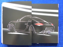 Lade das Bild in den Galerie-Viewer, Porsche Cayman S Typ 987c - Hardcover Prospekt Brochure 01.2010
