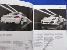 Lade das Bild in den Galerie-Viewer, Porsche Cayman S Typ 987c - Hardcover Prospekt Brochure 01.2010
