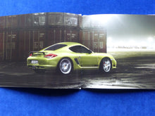 Lade das Bild in den Galerie-Viewer, Porsche Cayman R Typ 987c MJ 2012 - Hardcover Prospekt Brochure 01.2011
