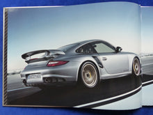 Lade das Bild in den Galerie-Viewer, Porsche 911 GT2 RS Typ 997 MJ 2010 - Hardcover Prospekt + Preisliste 05.2010
