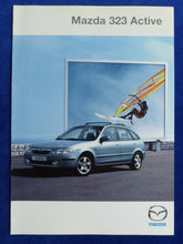 Lade das Bild in den Galerie-Viewer, Mazda 323 Active Sondermodell MJ 2000 - Prospekt Brochure 11.1999
